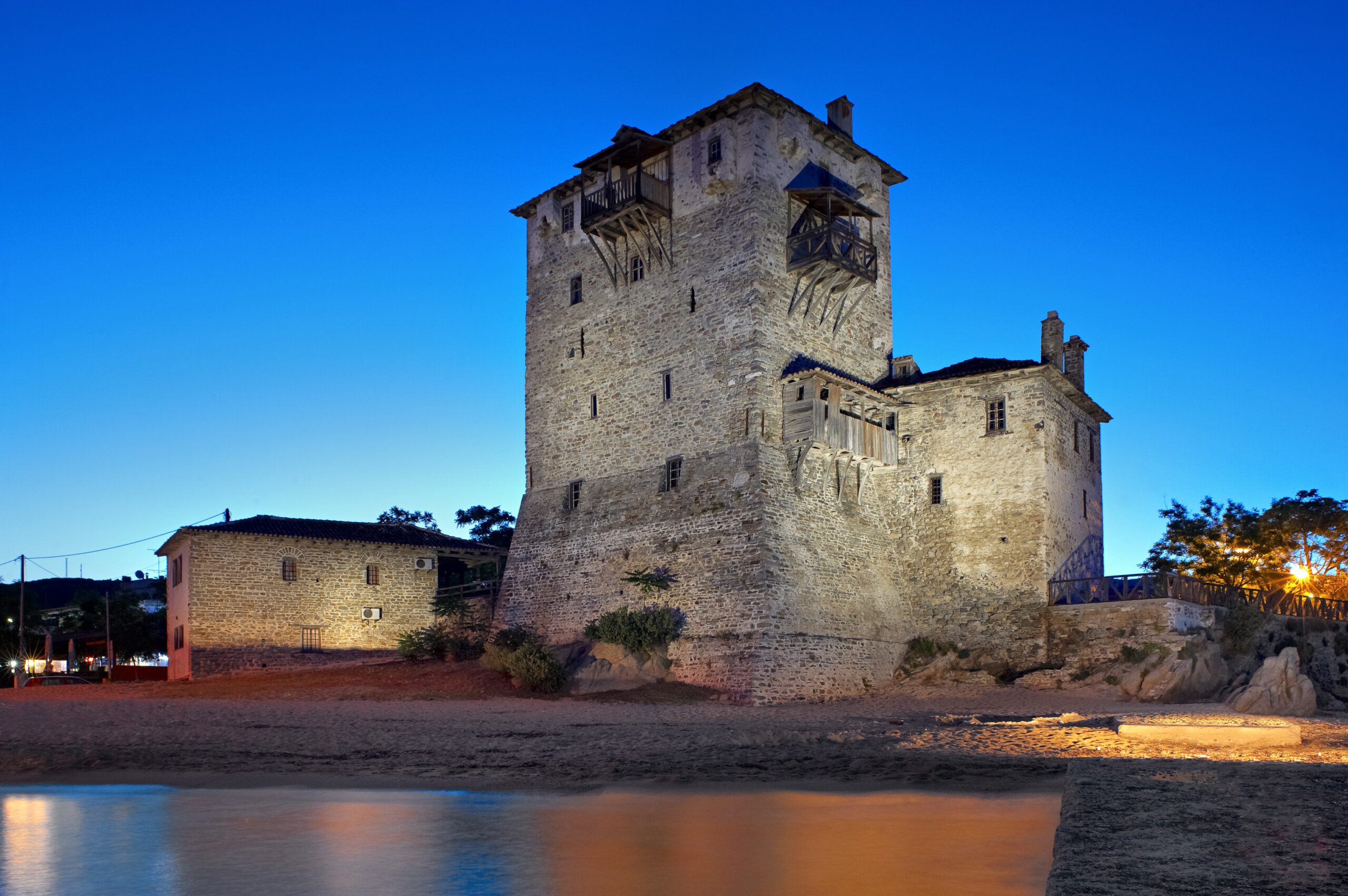 Night caption of the Byzantine tower of Ouranoupolu
