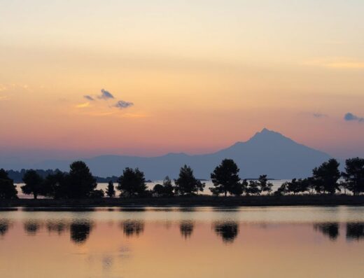 Livari lagoon in sunset with Mount Athos as a background