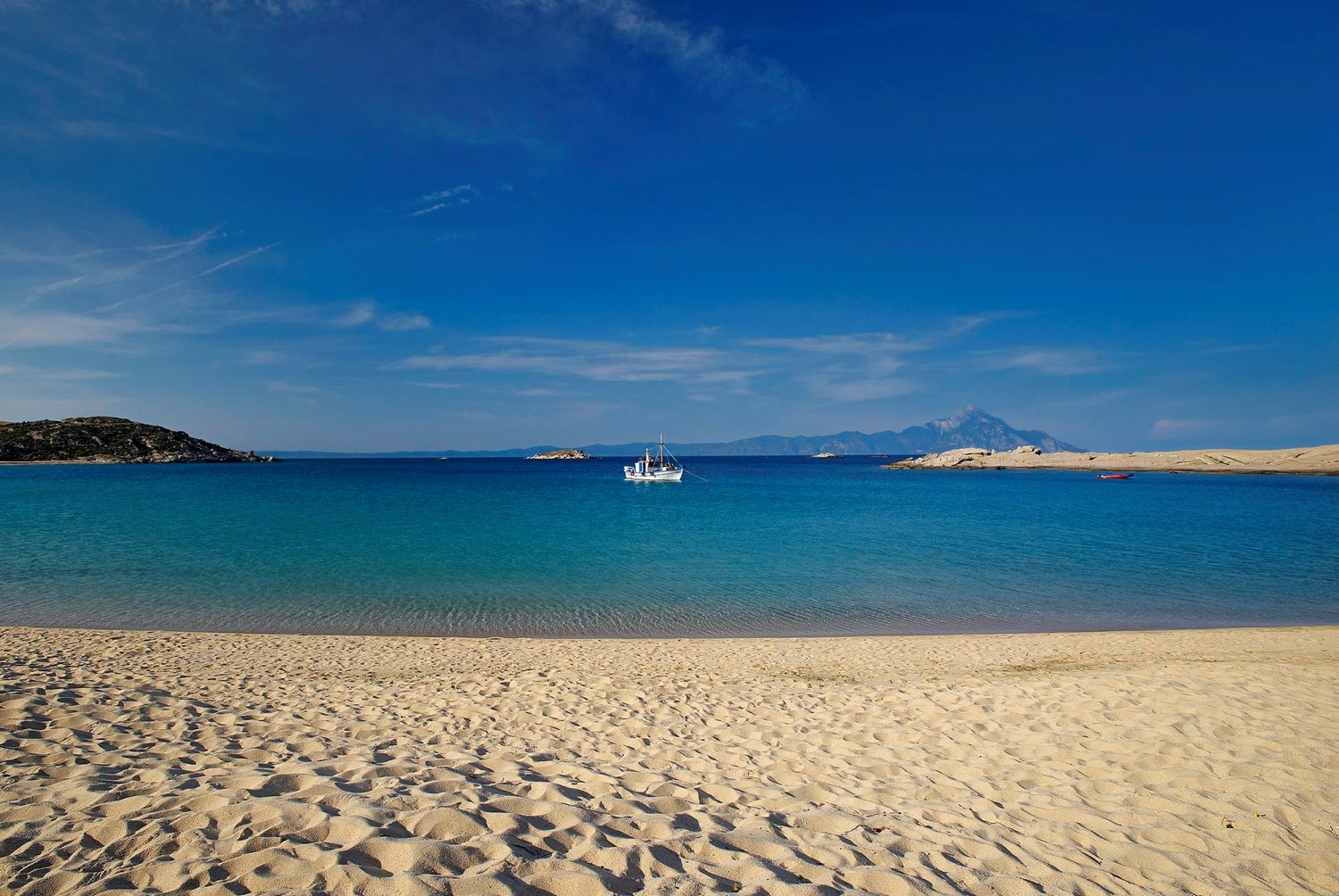 Photo of the sandy beach of Sarti  overlooking at Mount Athos