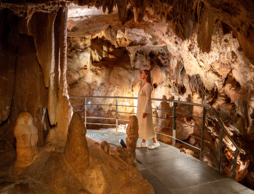 Inside Petralona Cave admiring stalagmites and stalaktites